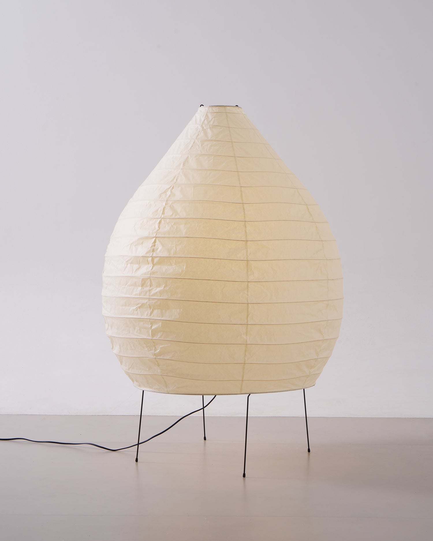 Akari 23N floor lamp Japanese minimalist aesthetic in modern bedroom or study space