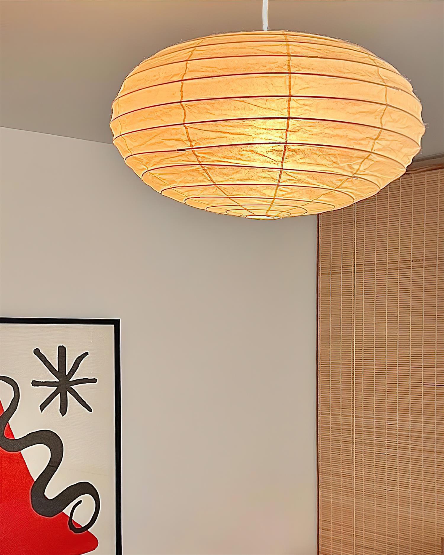 Akari 50EN Japanese washi paper pendant light fixture close-up detail showing pleated paper texture and iron wire frame construction