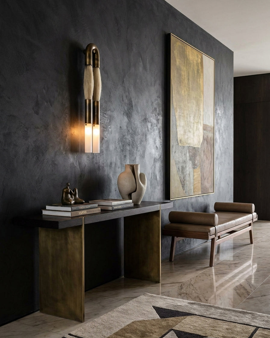 Branwick sculptural dual-head wall sconce close-up detail showing horsehair wrapped accents, brass frame, and frosted glass construction