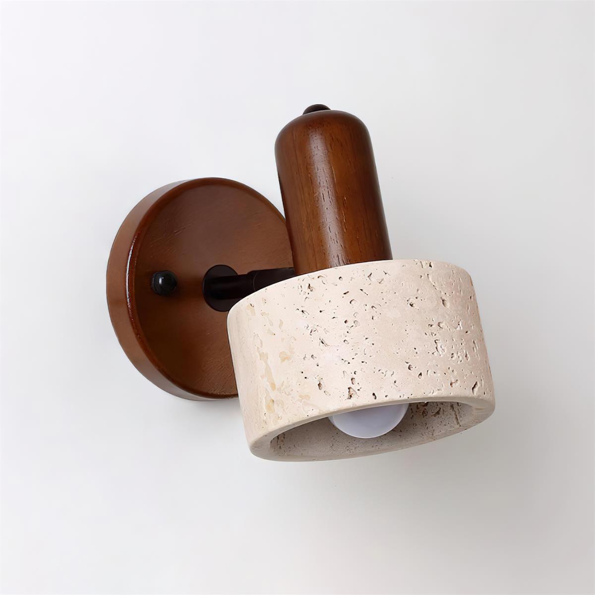 Travertine wall sconce architectural detail showing metal mounting hardware and wood base junction