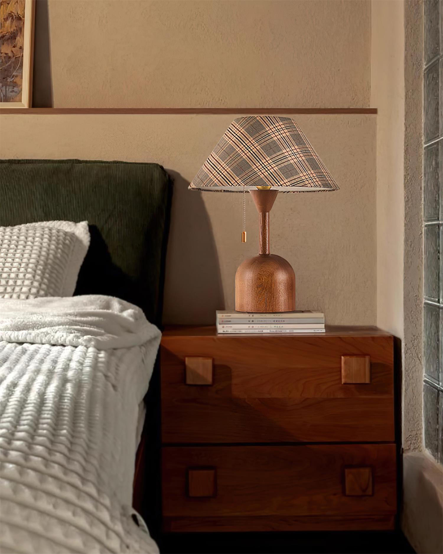 Classic plaid cabin table lamp creating cozy ambient light in rustic interior