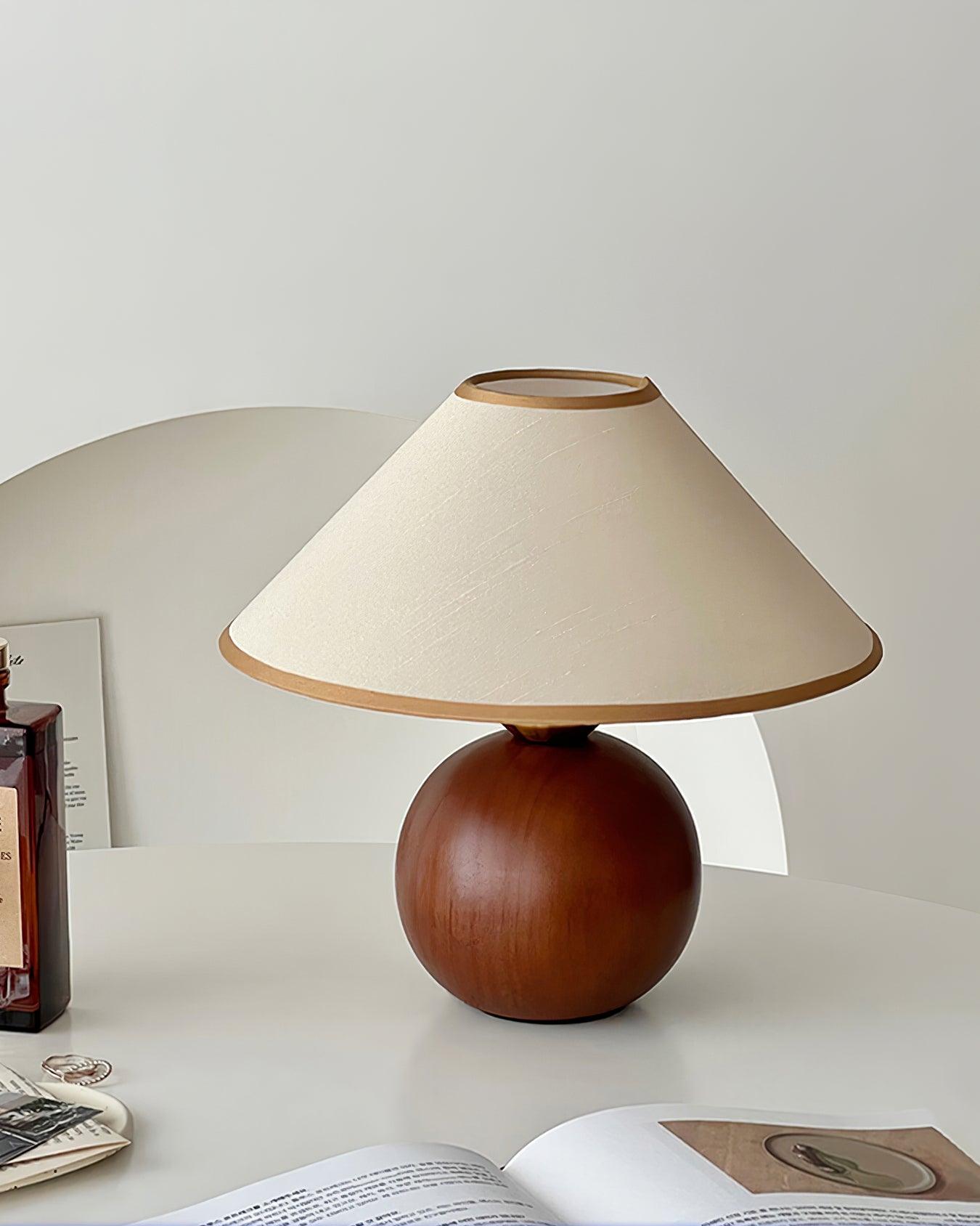 Natural wood table lamp with tapered shade, product detail and construction view