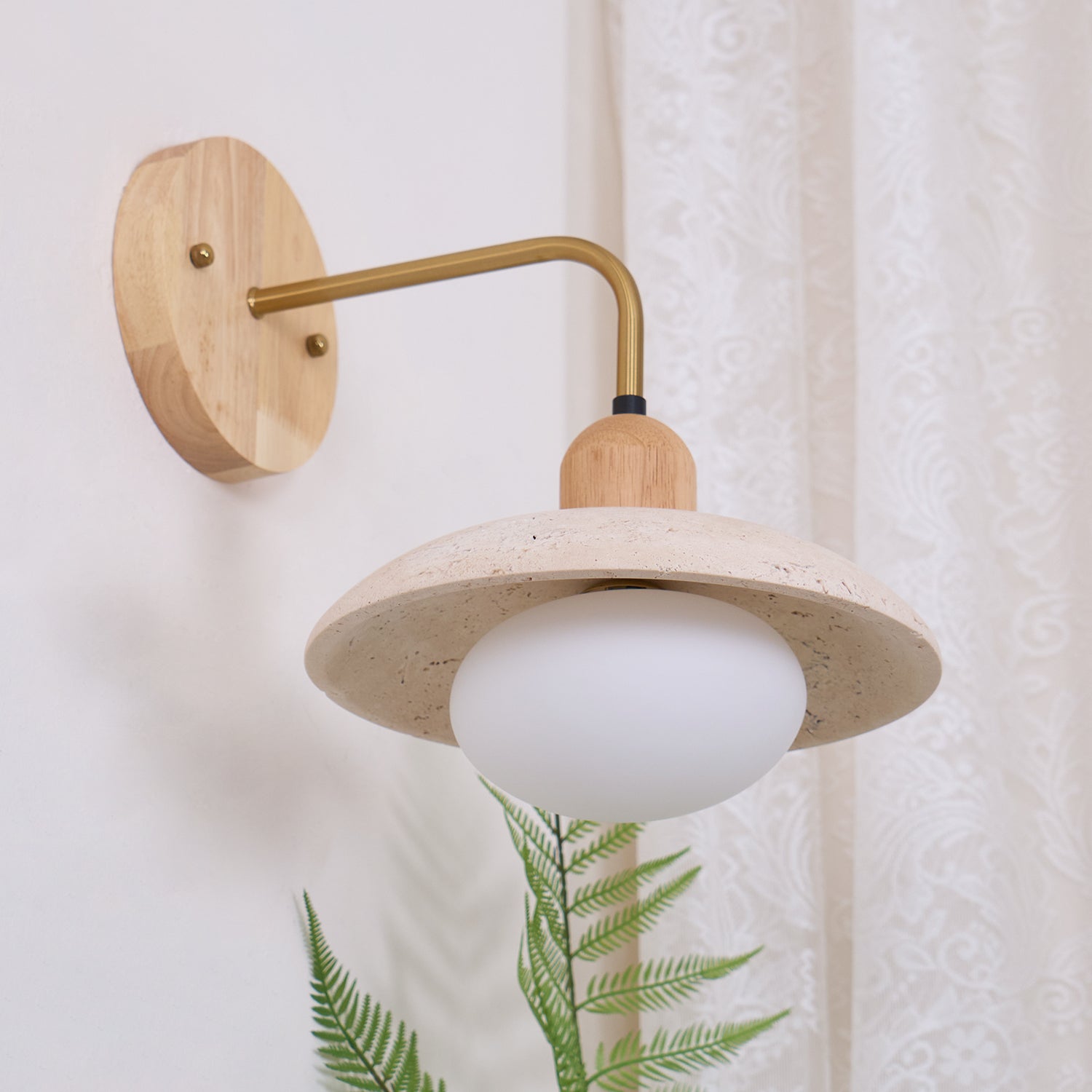 Modern hallway with single Carolia wall sconce creating warm wayfinding light along corridor