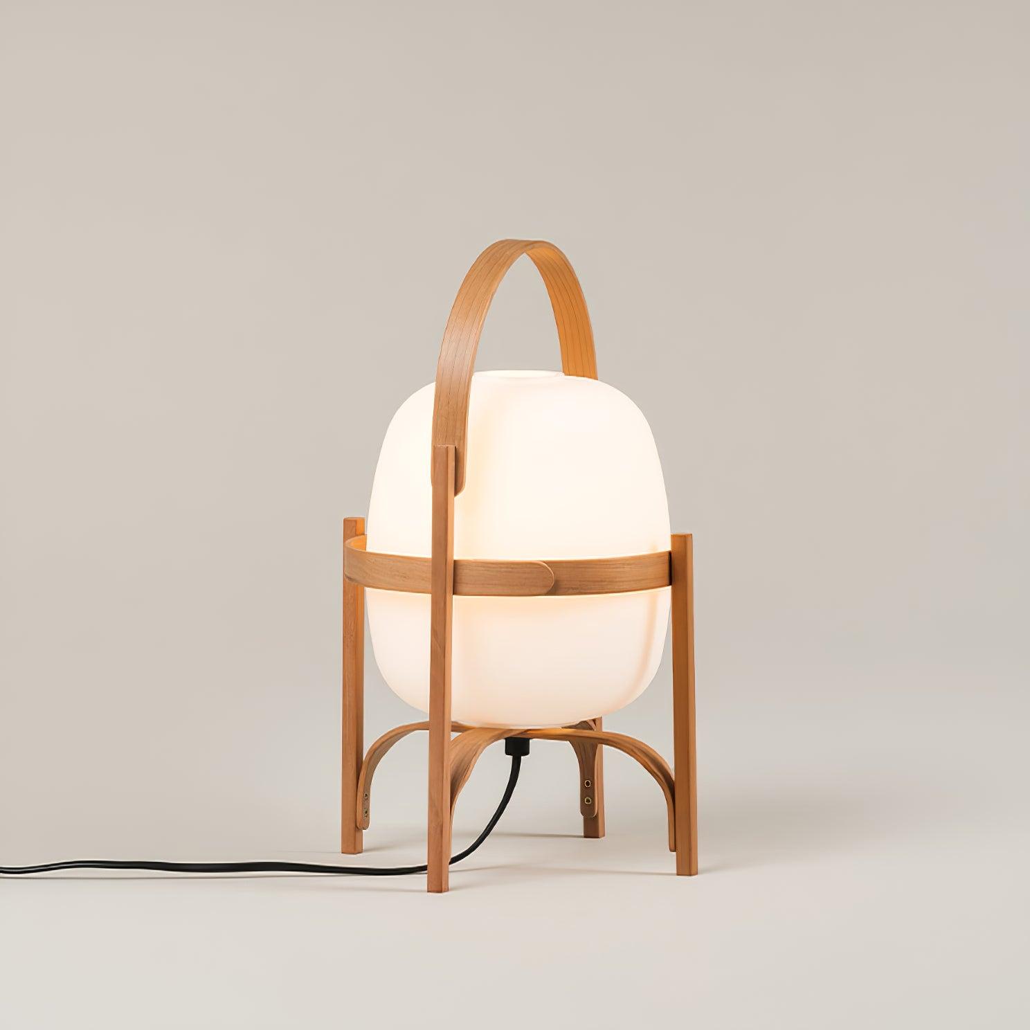 Modern portable lantern lamp in neutral interior with minimalist styling