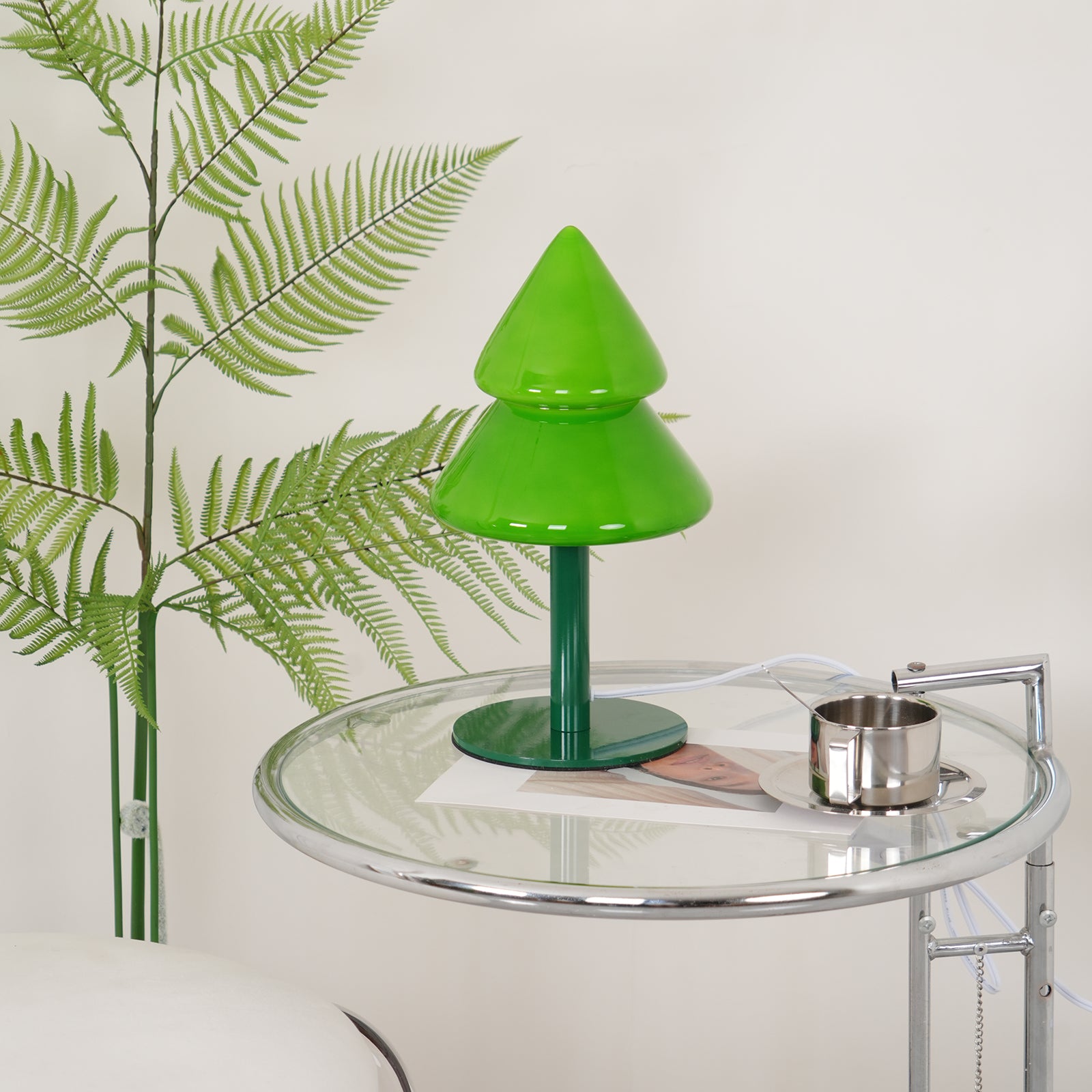 Seasonal transition styling with Christmas tree lamp in autumn and winter settings