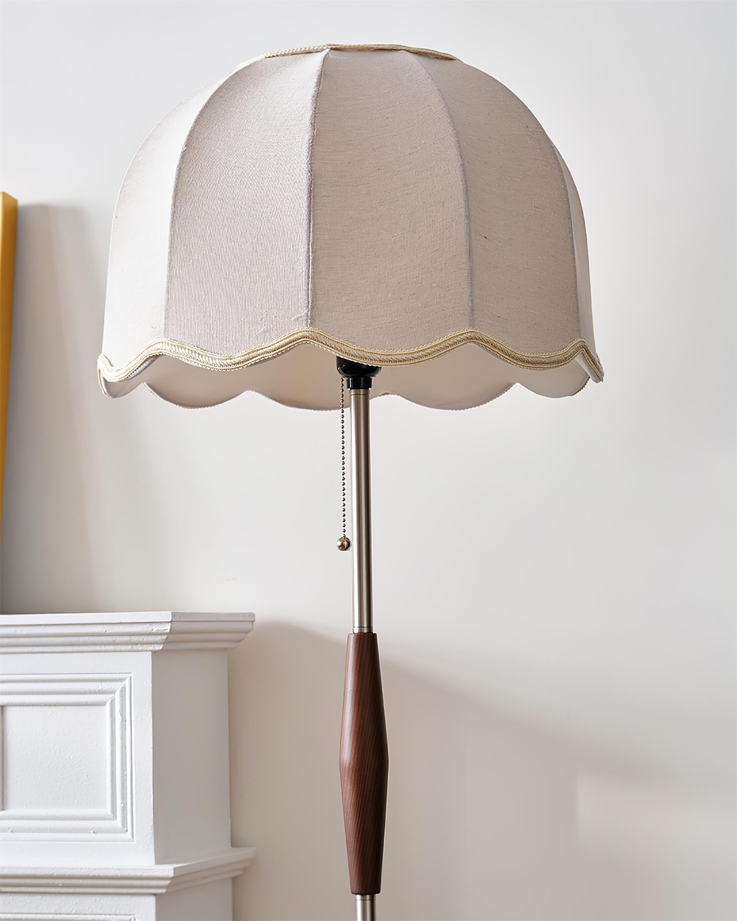 Colette scalloped fabric floor lamp full-body view showing metal structure and wooden accent, neutral interior styling