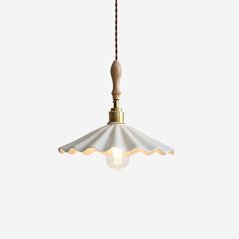 Daisy ripple ceramic pendant lamp close-up showing scalloped white shade with rippled detailing and exposed brass hardware