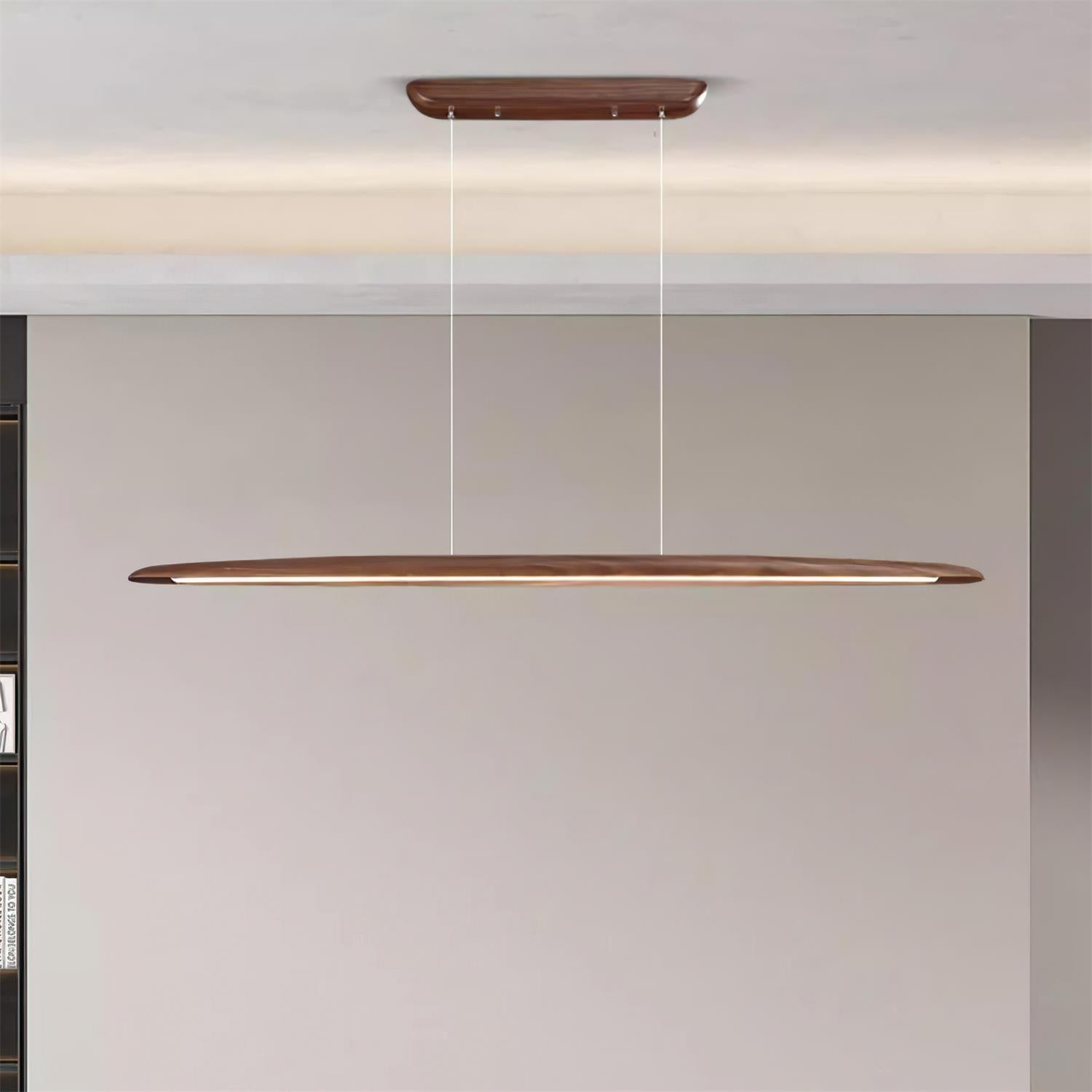Modern linear LED chandelier close-up showing integrated warm white LED design and wood frame construction