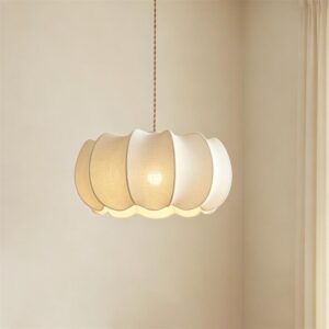Eloria pendant light hanging with warm glow in minimal contemporary interior with adjustable cord
