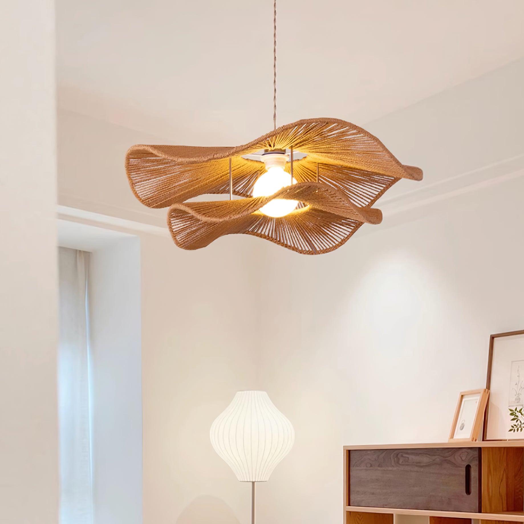 Gunilla wavy rattan pendant light in neutral wabi-sabi minimalist living nook corner installation