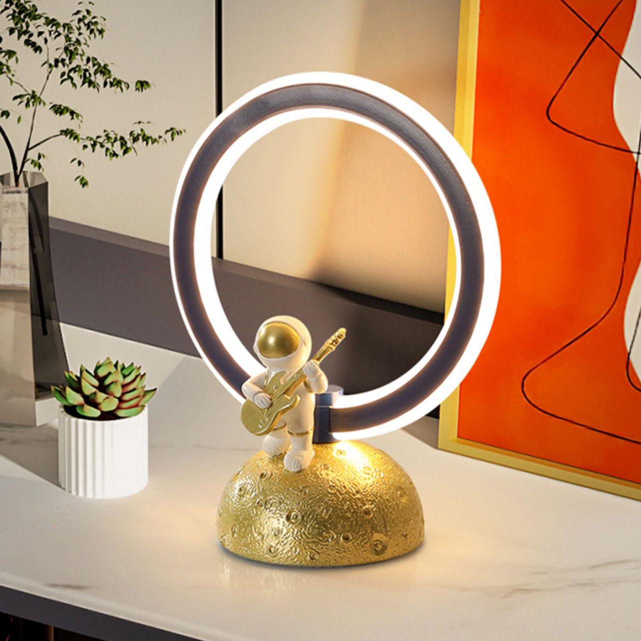 Modern LED astronaut lamp with dark gray ring and textured lunar base
