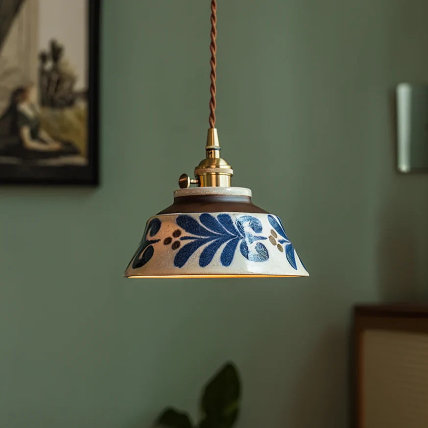 Hand-painted ceramic pendant light model D with artisan stripe pattern and brass hardware