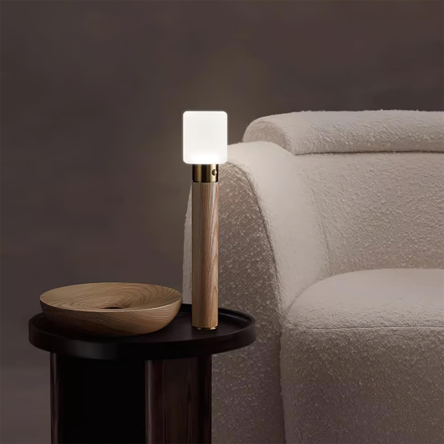 Wooden table lamp warm white 3000K integrated LED lighting creating cozy ambient glow in home setting