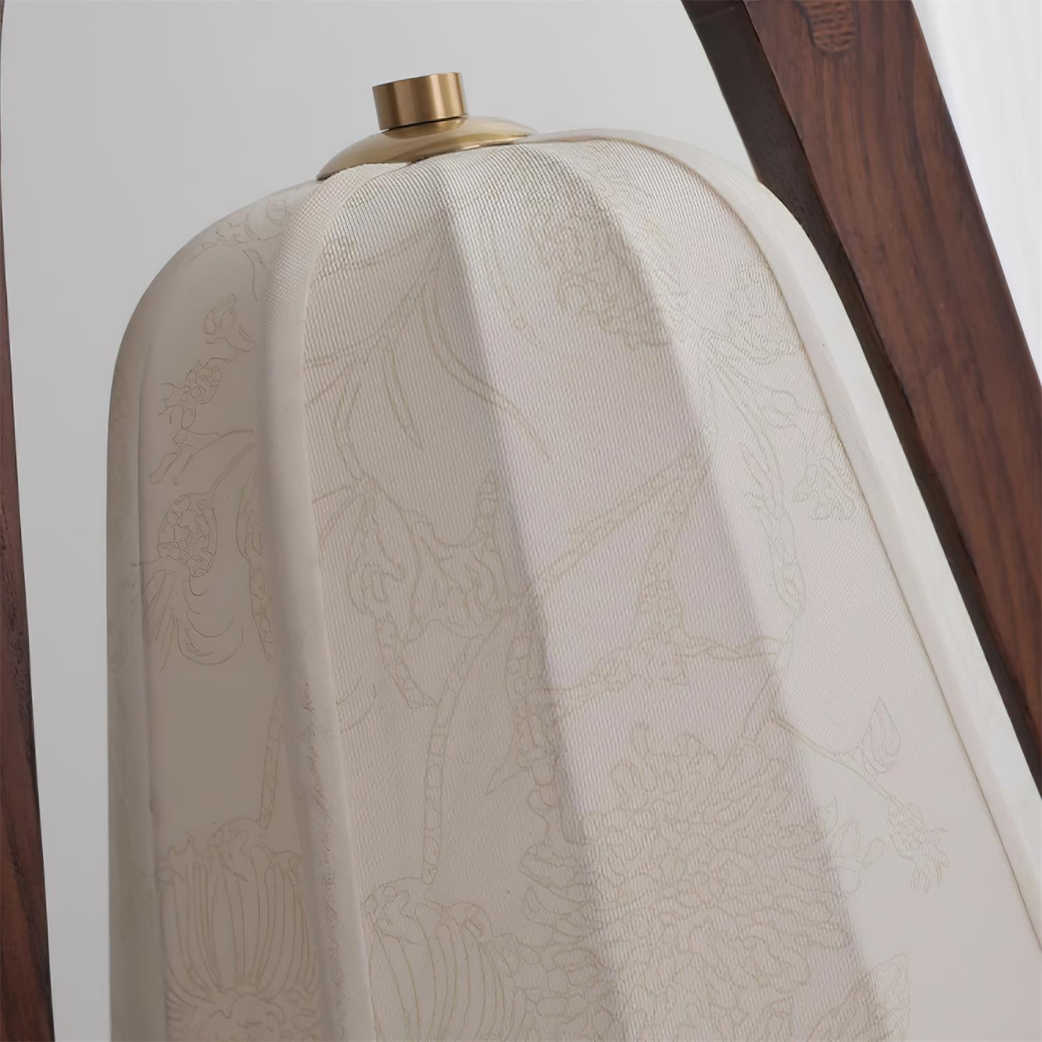 Modern wooden table lamp with cream fabric shade and warm light, minimalist Scandinavian interior design inspiration