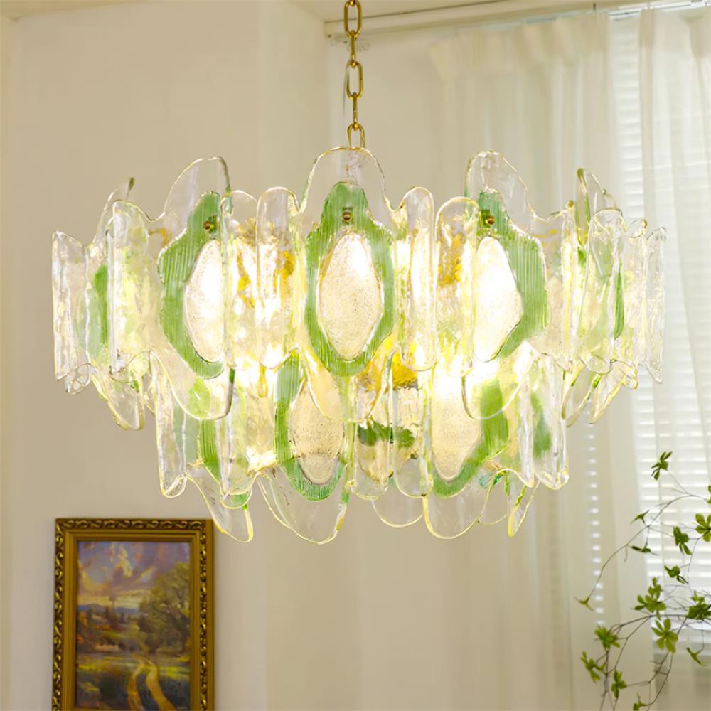 Green-tinted vintage glass chandelier with brass hanging chain, side window view interior decoration