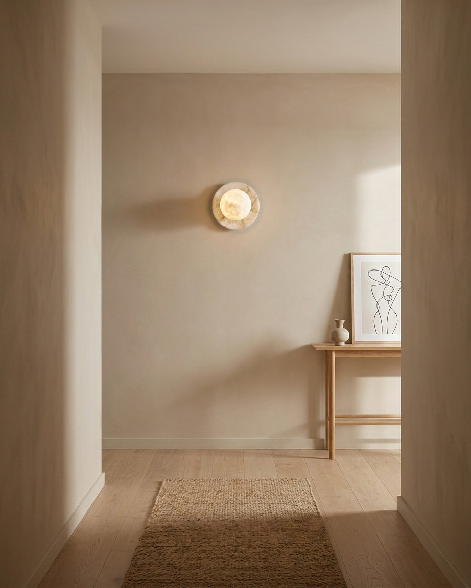 Alabaster Ball Wall Sconce in minimalist hallway with abstract wall art, warm neutral entryway lighting