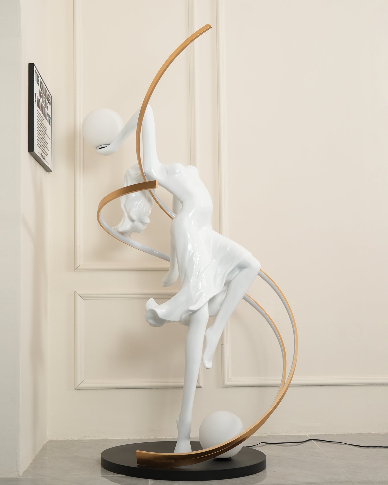 Goddess floor lamp illuminated creating atmospheric room ambiance with warm soft light distribution