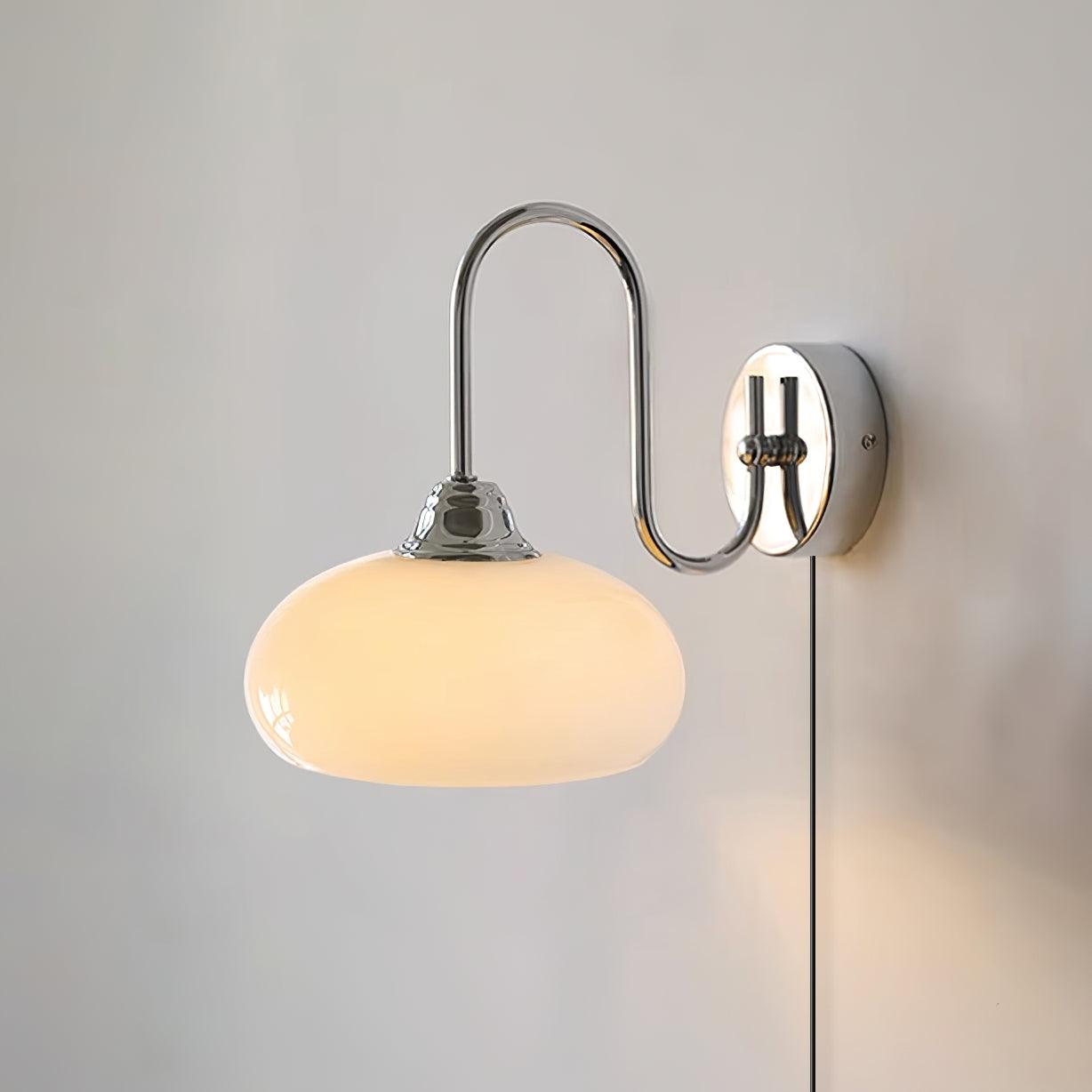 Damp-rated plug-in wall sconce in beige finish with textured glass dome, renter-friendly portable design ready for any room