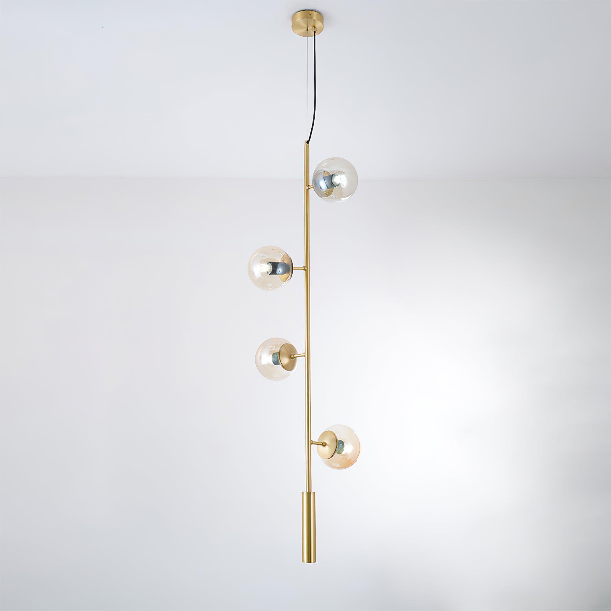 Luxury amber glass orb chandelier with brass accents in sophisticated interior design