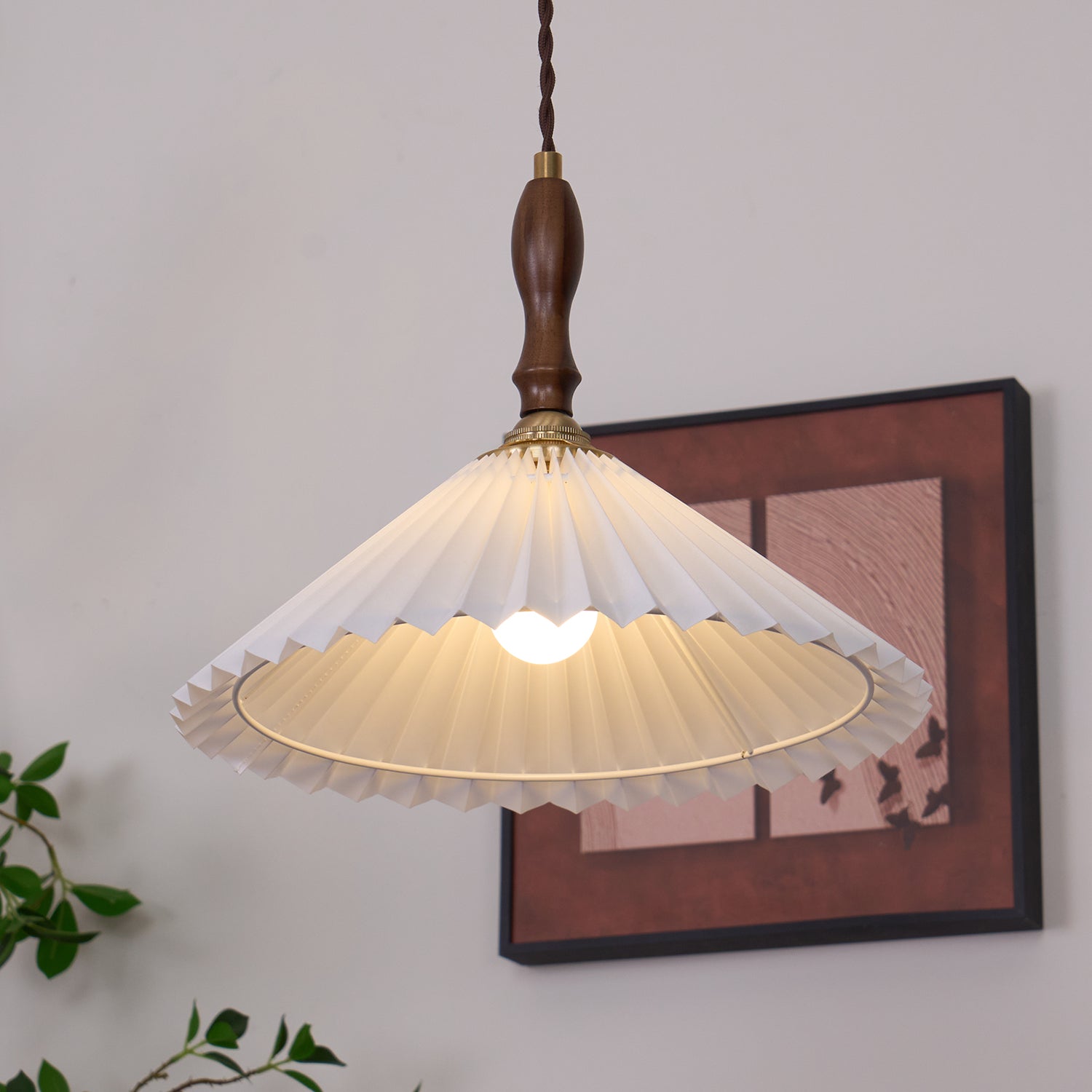 Pleated fabric pendant lamp in Japandi interior design setting with minimalist modern aesthetic