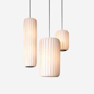Minimalist white ribbed pendant light with fabric shade, modern Zen design aesthetic