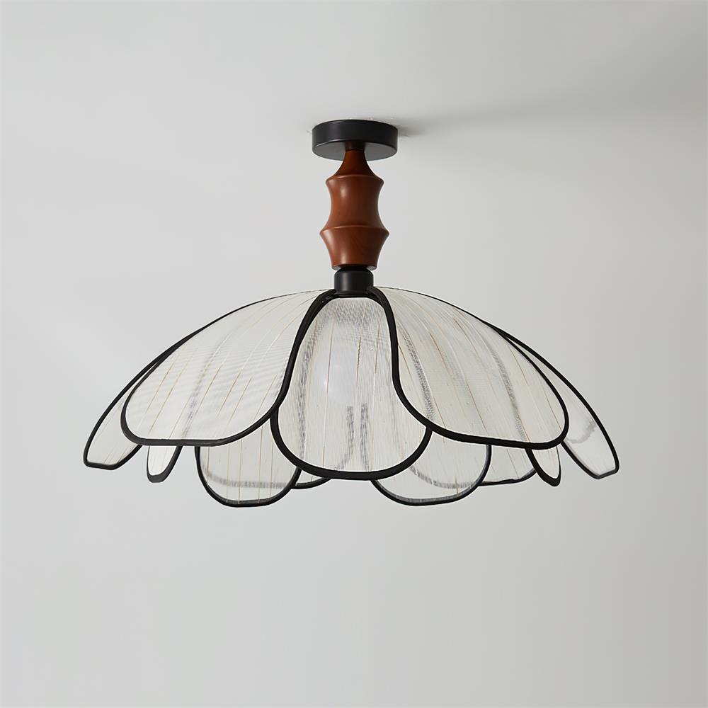 Modern petal-shaped ceiling light with translucent fabric shade and elegant black edging, contemporary fixture design