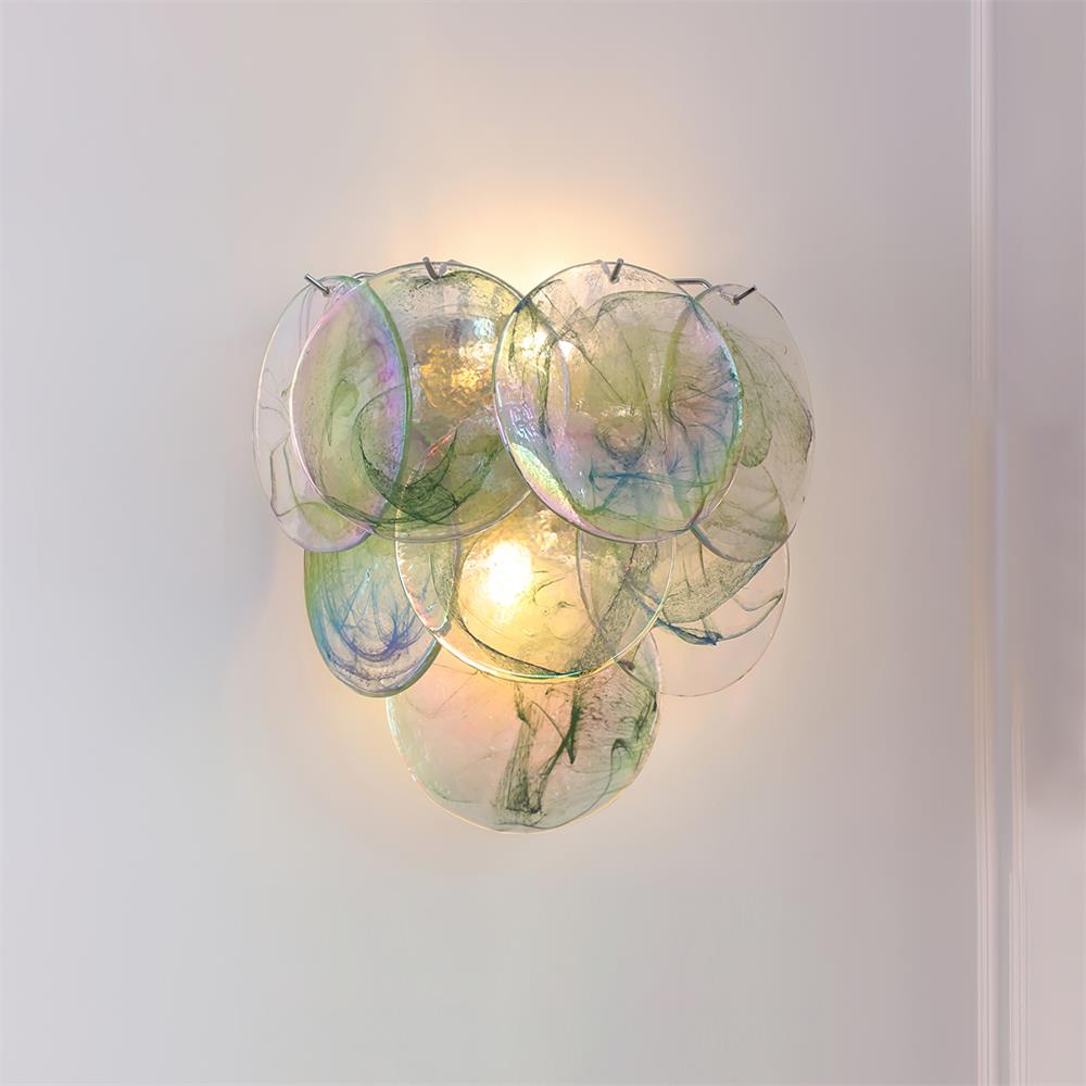Talia hand-blown glass bubble wall sconce in green marbled translucent finish on white background, contemporary glass art wall lamp