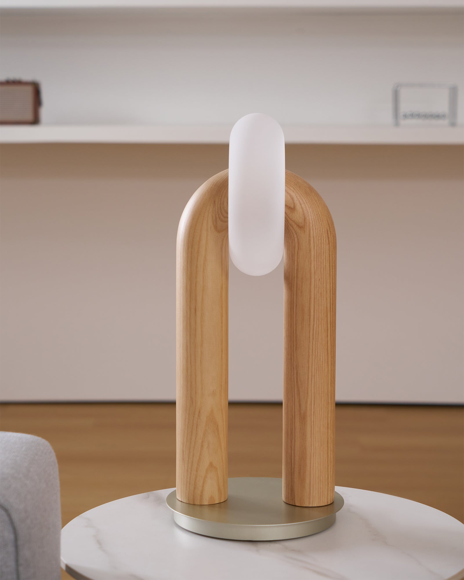 Teelo lamp with three color finish options natural wood walnut and black arranged for comparison