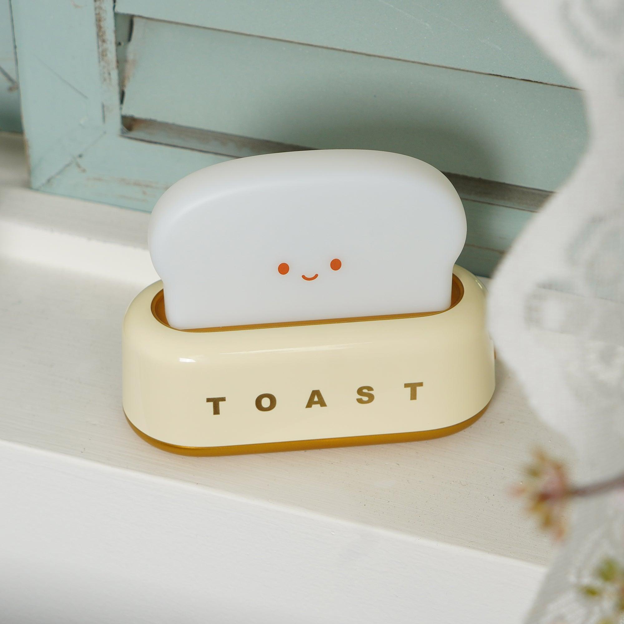Toaster table lamp with dimming control via long-press toggle switch for adjustable warm light