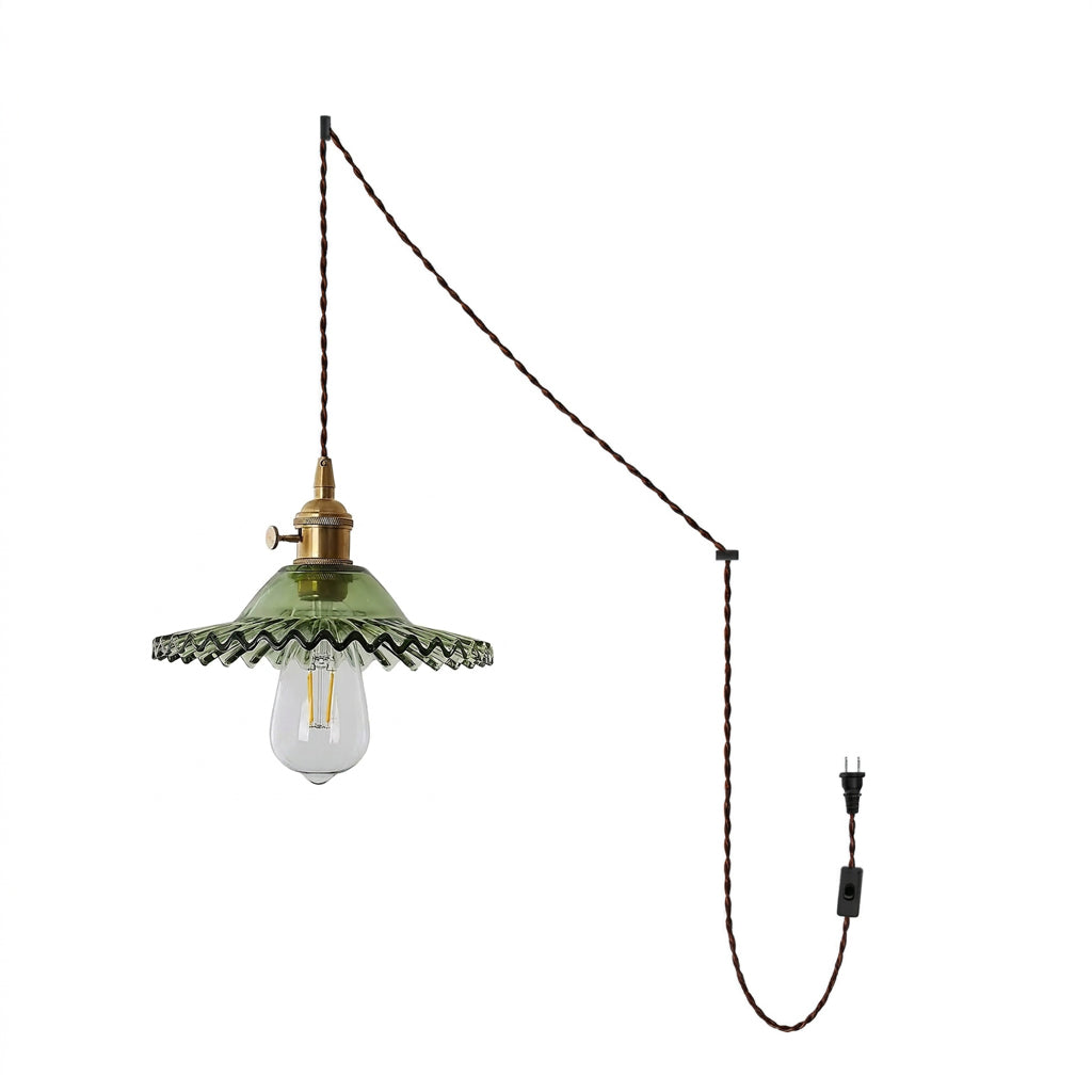 Vines plug-in pendant light with gold vine frame and green fluted glass, close-up front view studio shot