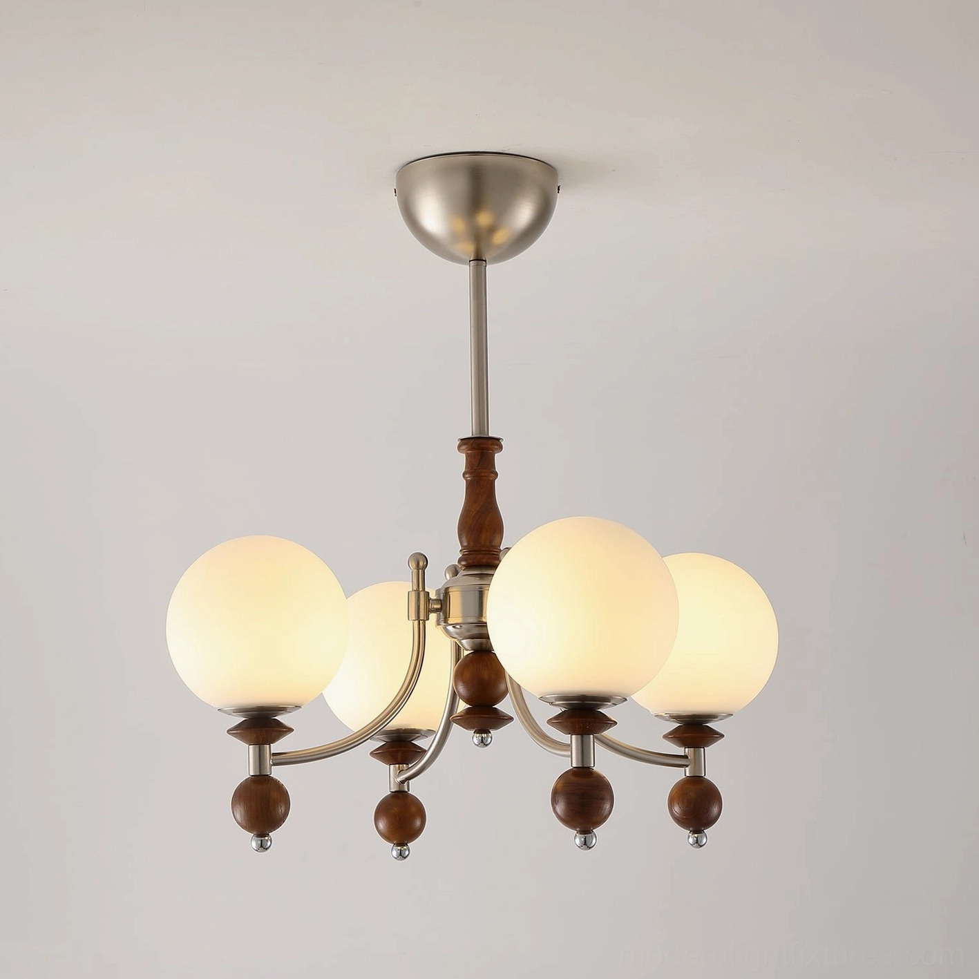4-head retro globe chandelier with black metal frame and frosted glass globes - compact modern pendant fixture