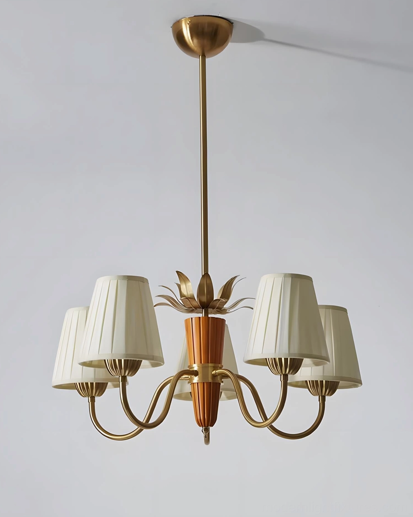 5-head mid-century modern brass chandelier with pleated fabric shades, studio frontal view