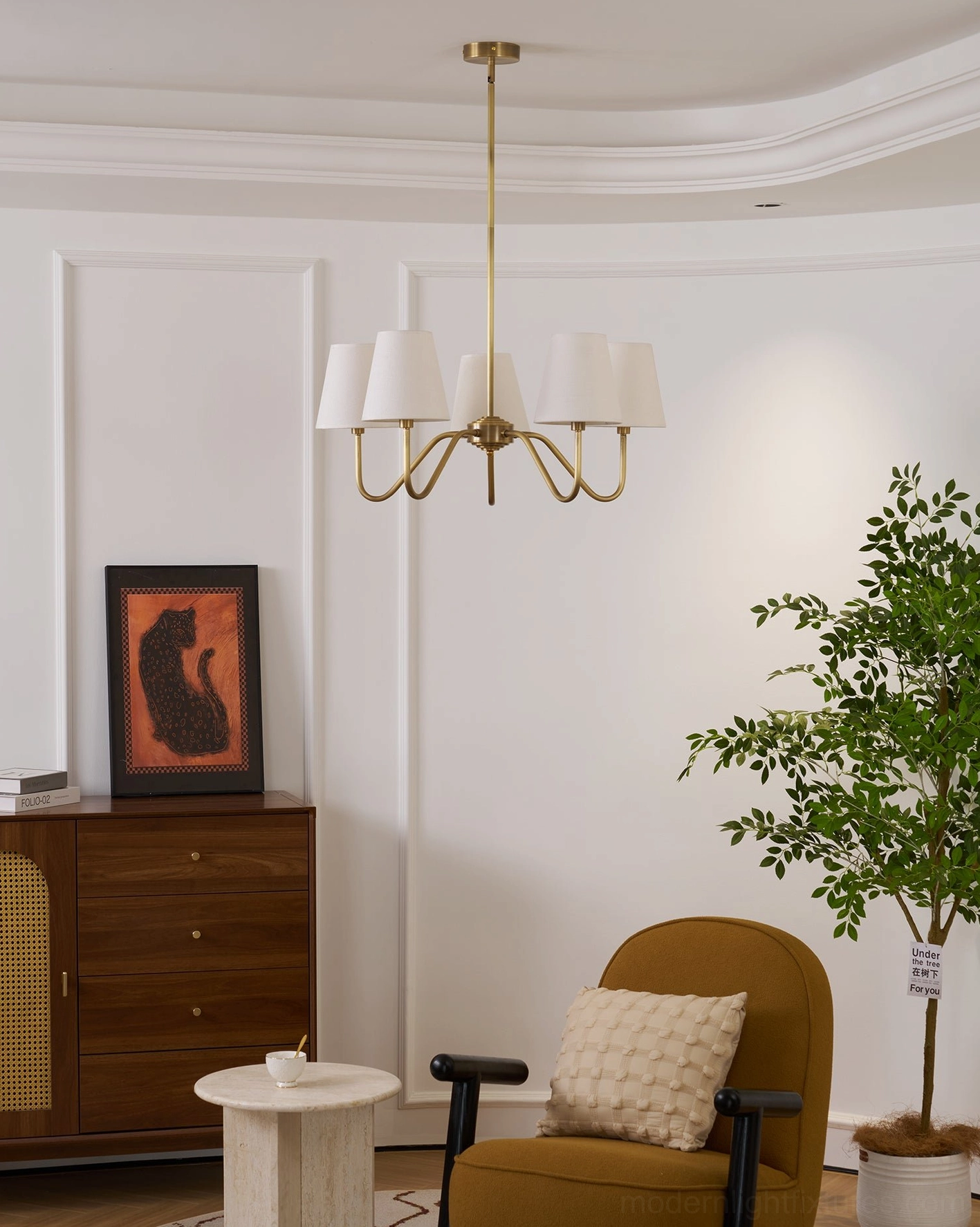 5-light tapered brass chandelier in French-style living room, elegant minimalist mid-century modern design