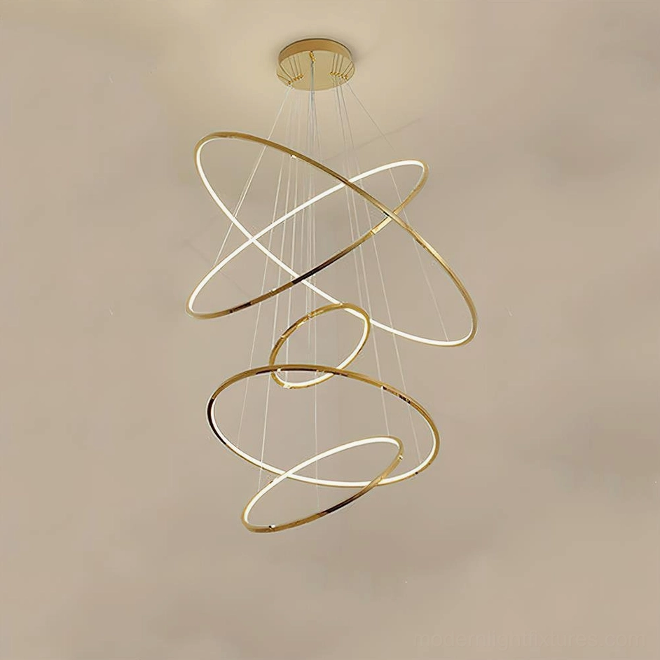 5-ring modern gold ring chandelier creating dramatic sculptural lighting statement in contemporary space