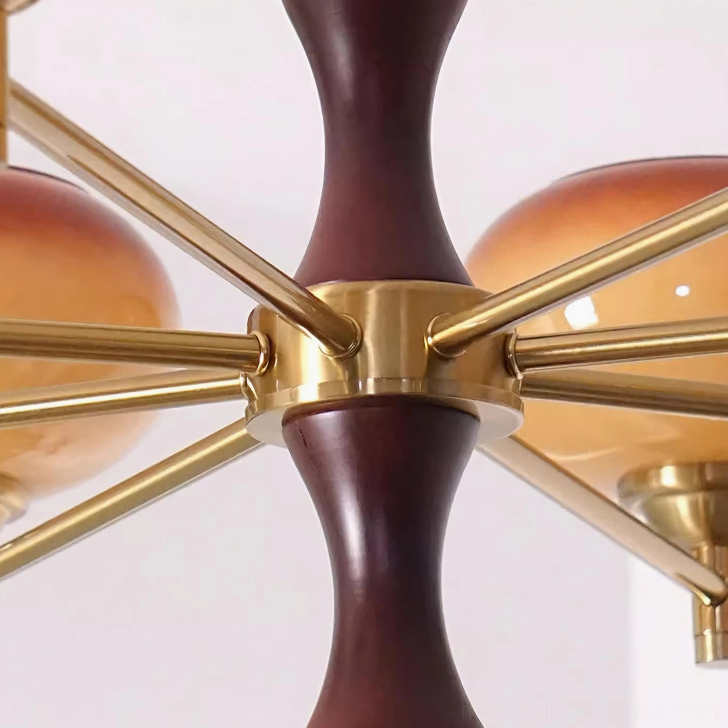 6-head mid-century modern chandelier highlighting gradient glass shades, decorative brass hardware, and natural wood central column detail