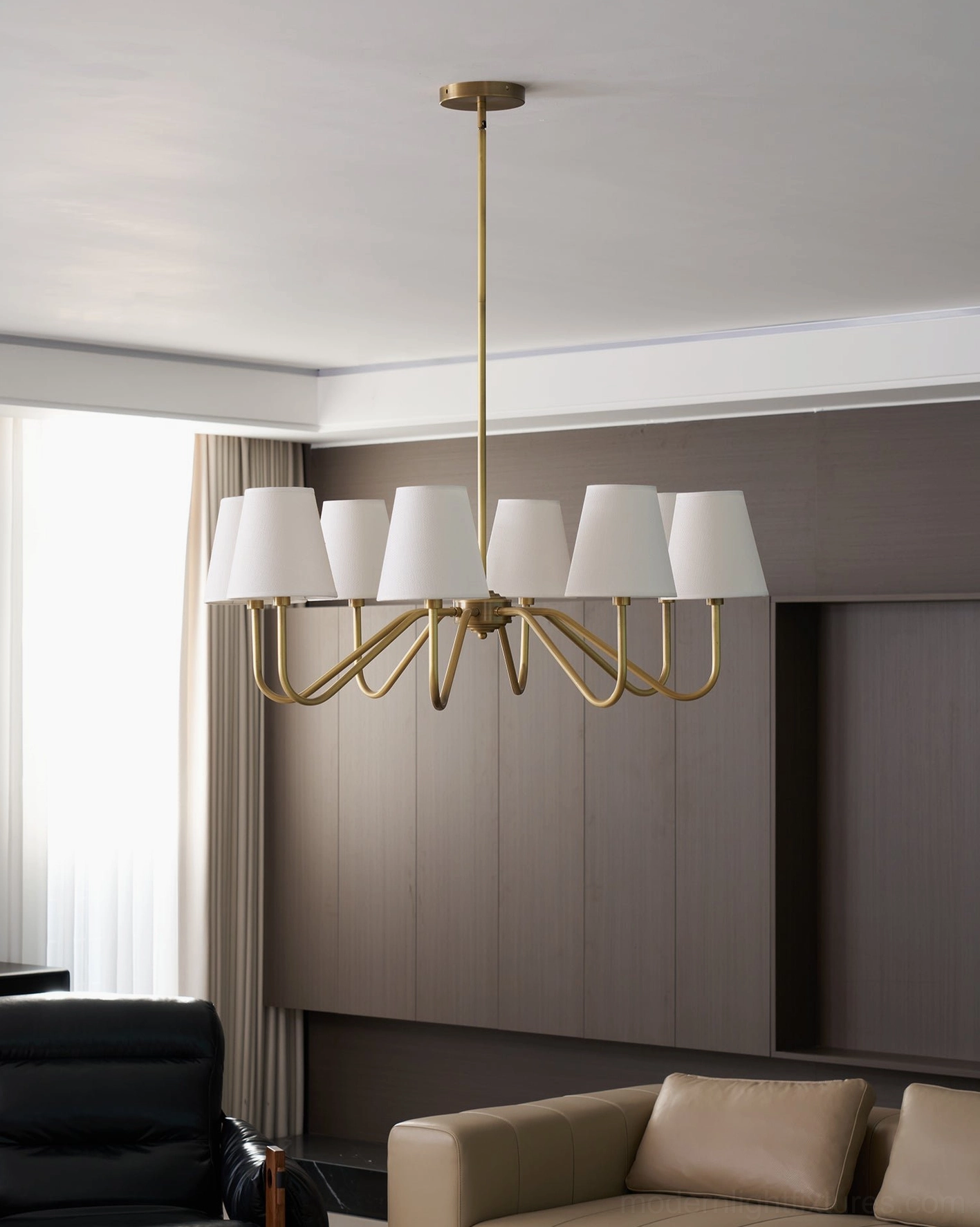 6-light brass chandelier in dark modern living room, warm luxury ambiance, contemporary interior styling