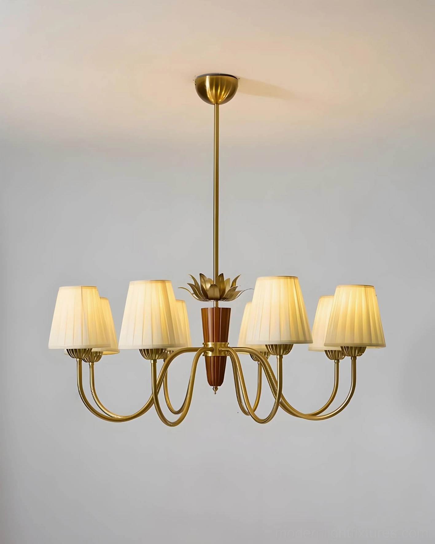 Mid-century modern 6-light chandelier with wider pleated shades and brass wood-toned accents, studio view