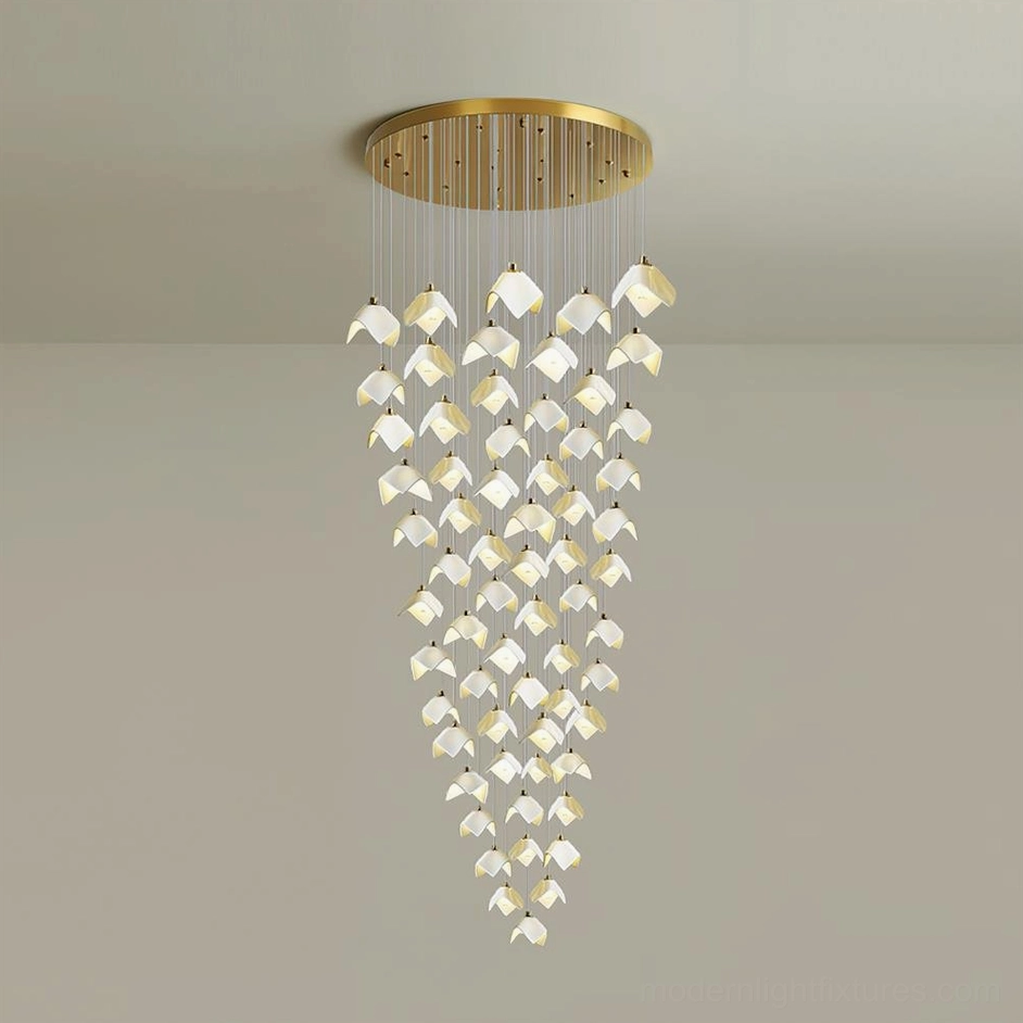 64-head cascading bloom chandelier creating architectural statement in hotel atrium with full cascade effect