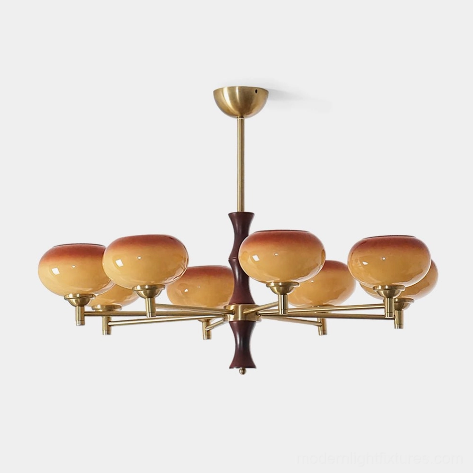 8-head mid-century modern vintage chandelier with gradient amber-brown glass shades, brass arms, and dark wood central post - overhead front view