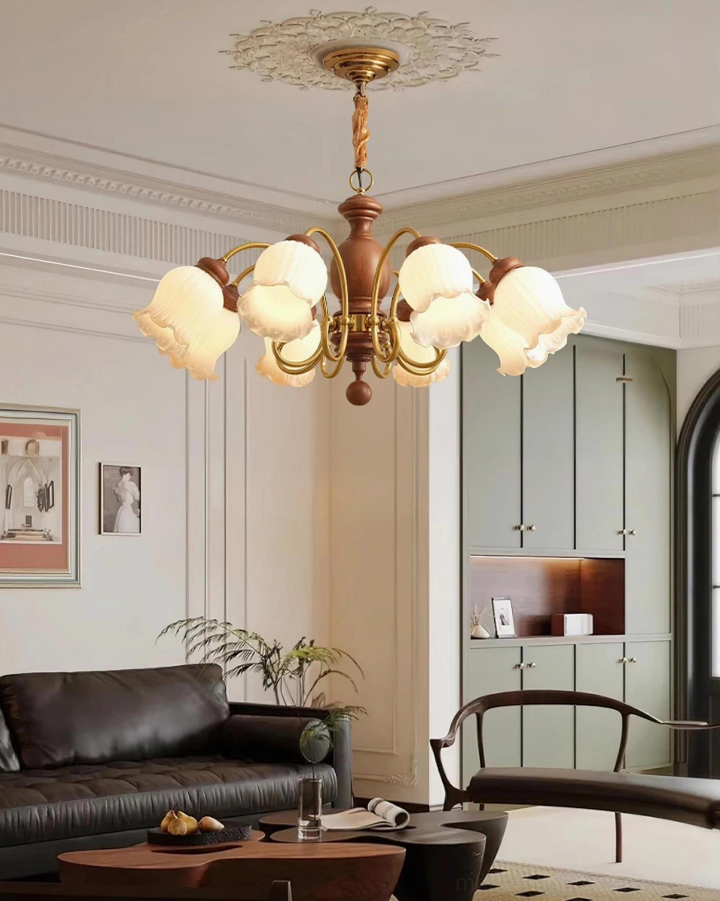 8-head pendant chandelier low-angle view in mid-century modern living room with leather furniture