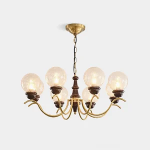 Eight-light vintage brass globe chandelier with walnut accents, front overhead studio view showing crackled glass shades and polished brass arms