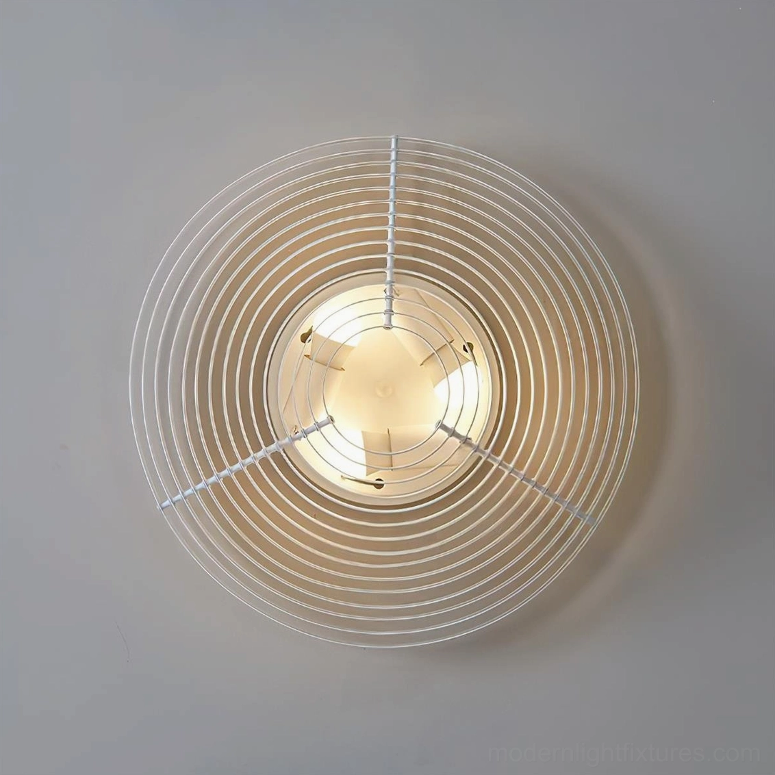 A662 slatted ceiling fixture front view exposed central light circular metal frame