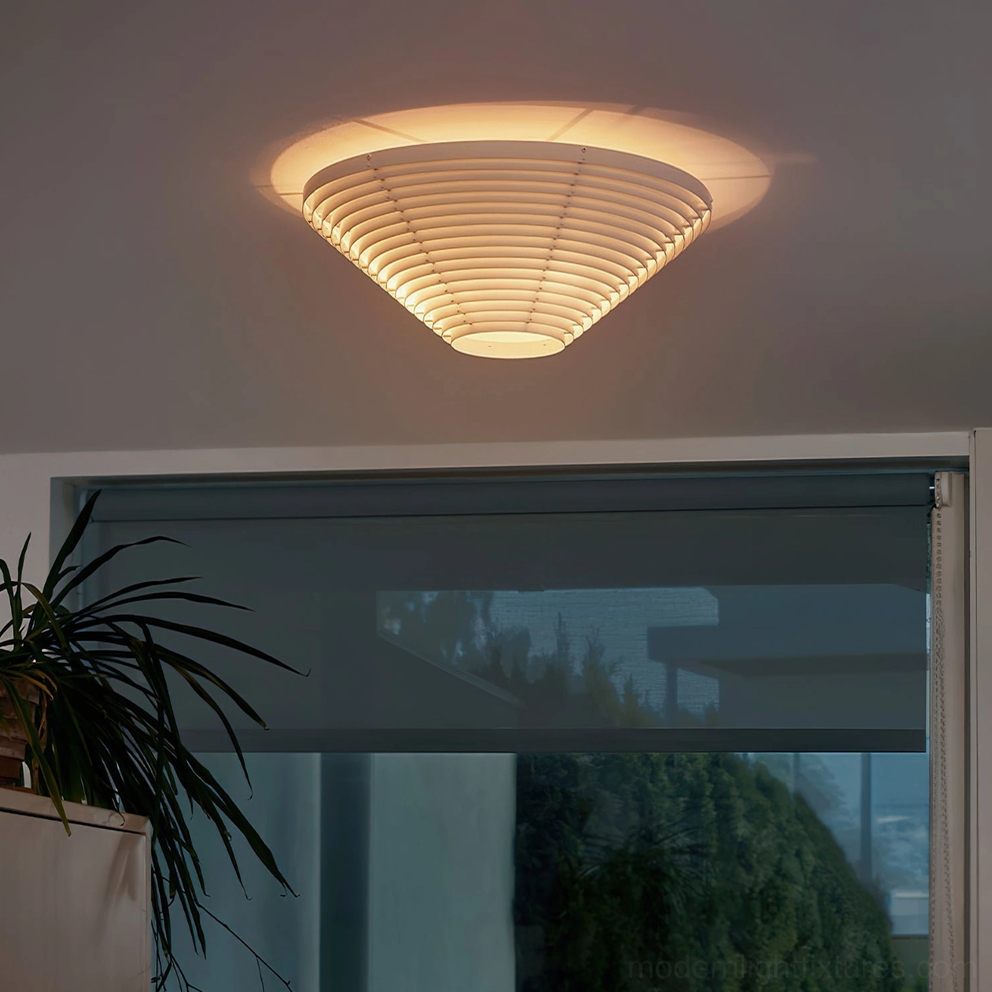 A662 ceiling light illuminated in residential room ambient warm glow layered slats