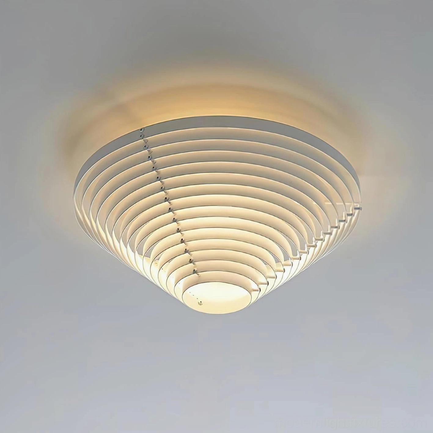A662 slatted ceiling light illuminated warm glow symmetrical layered metal design