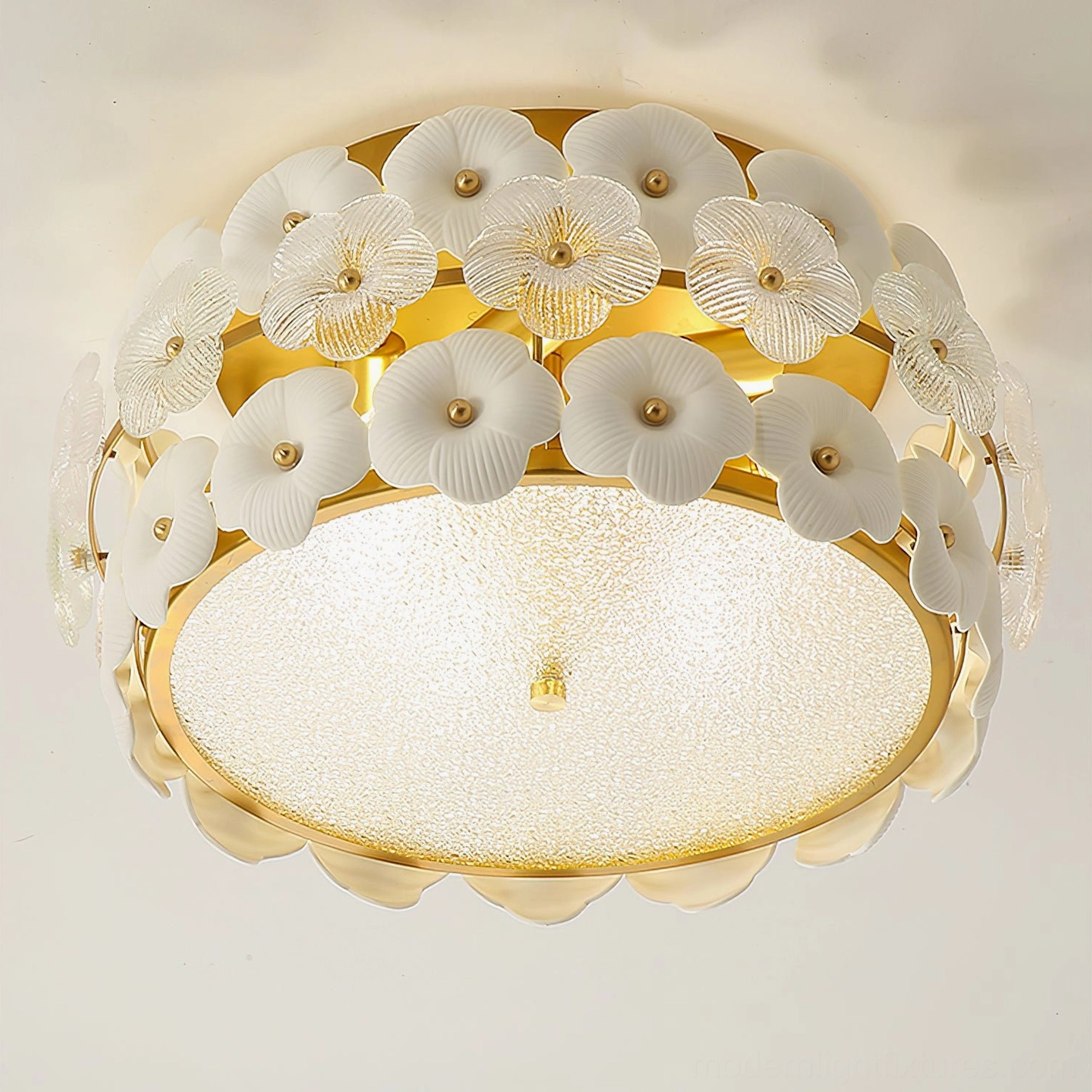 Abella frosted glass flush mount ceiling light with mixed white ceramic flower accents and gold metal frame