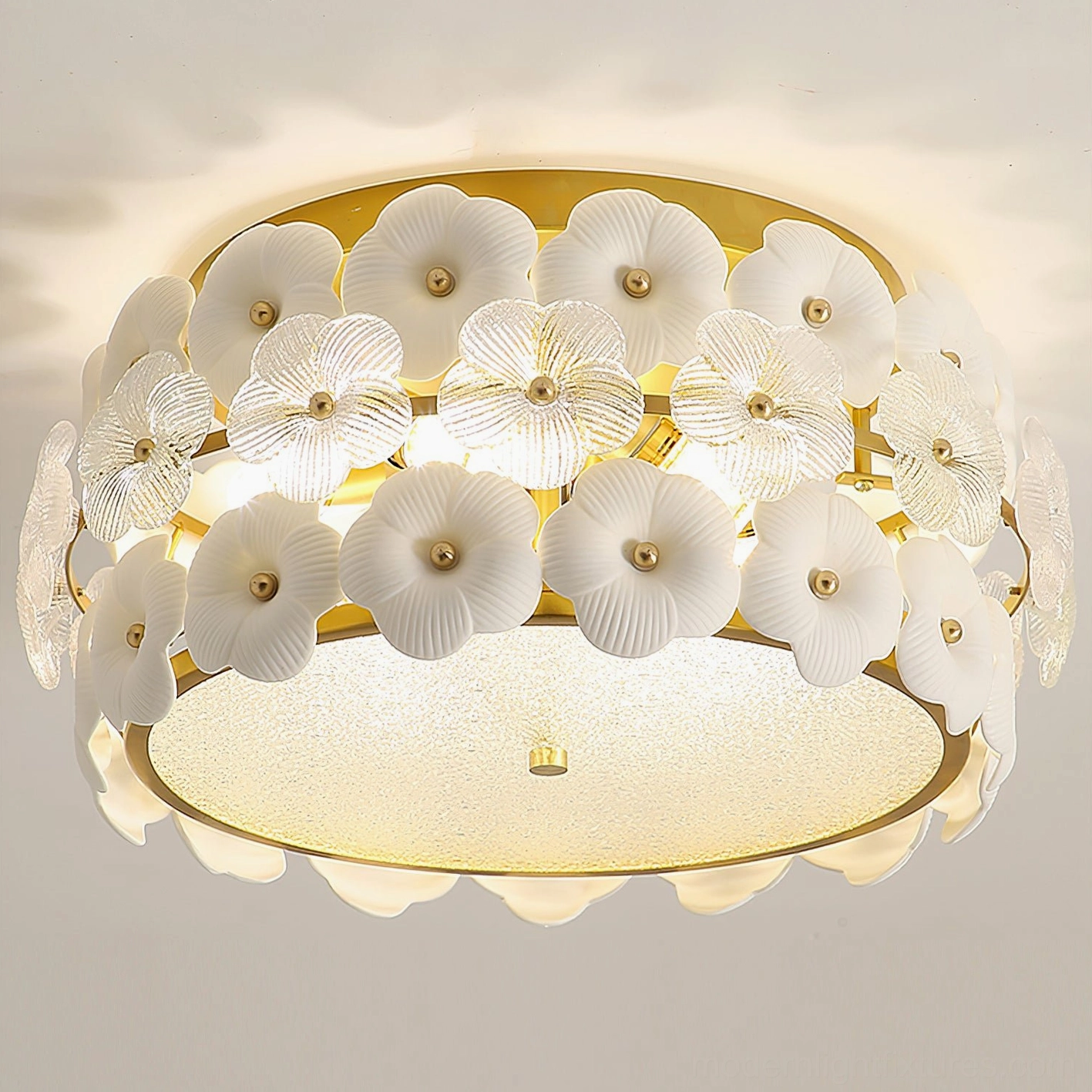 Angled top-down view of Abella ceramic flowers flush mount ceiling fixture with fully lit warm light and complete flower ring