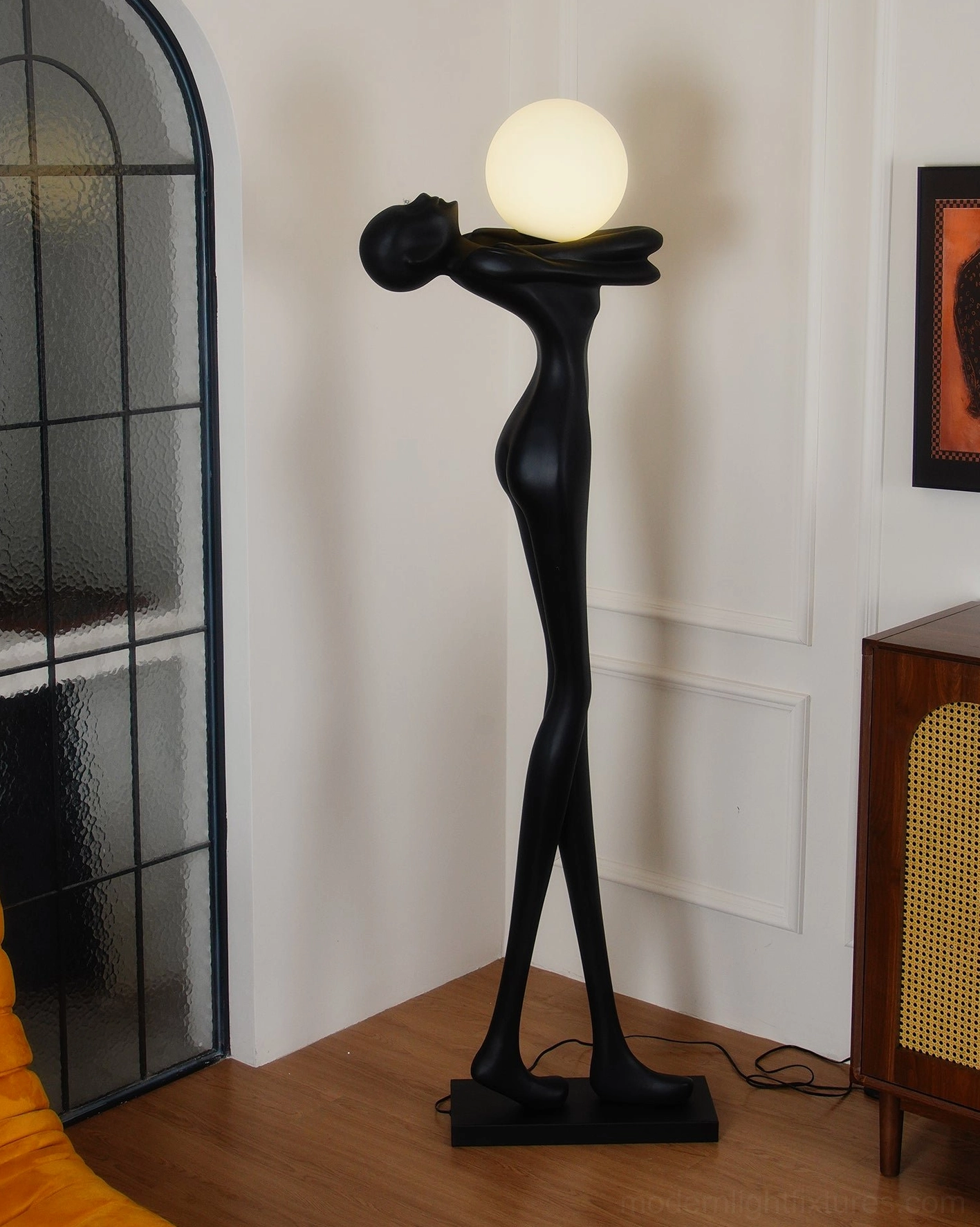 Abstract human form floor lamp minimalist design, square base, matte black resin artistic fixture