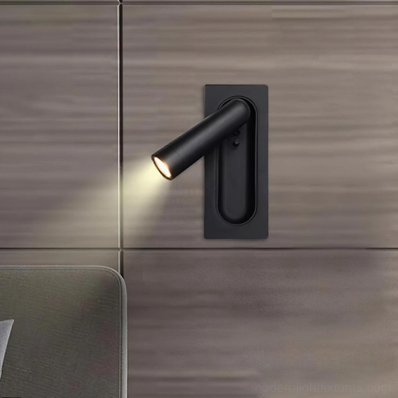 360-degree rotatable bedside wall lamp installed on wood cabinet with warm light illuminating reading area