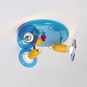 Contemporary round ceiling spotlights with polished blue metal base and red power switch, side oblique view