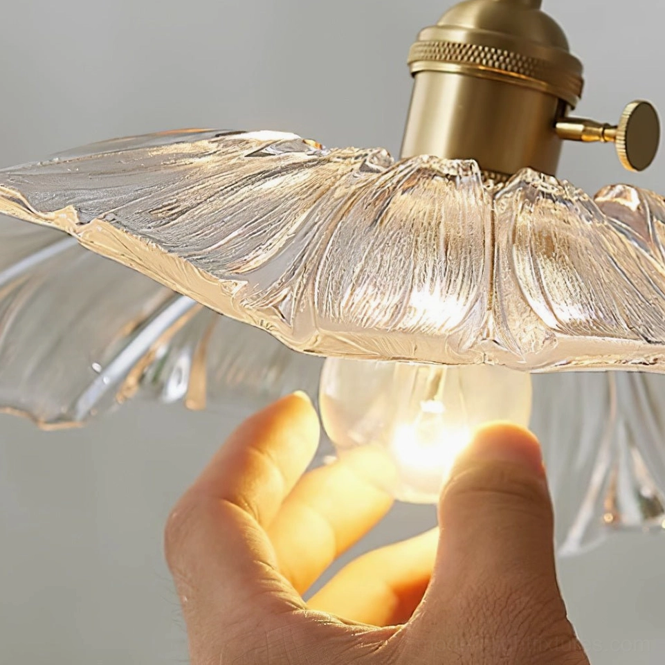 Adjustable glass flower pendant light with textured petal shade and light diffusion